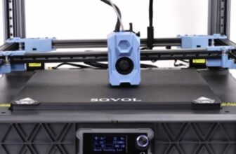 Sovol SV08 CoreXY 3D printer with a blue toolhead on a gantry over a stationary print bed